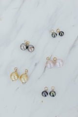 Wings Hawaii Pearl earring charms in solid 14k yellow gold. Fine jewelry handmade with aloha in Maui. Pink freshwater pearls, Tahitian pearls, Golden South Seas Pearls. Made to pair with Charm Bar Mix + Match Hoop Earrings.