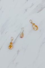 Wings Hawaii Penniform Cone Shell necklace charms in 14k gold-filled or sterling silver. Fine shell jewelry handcrafted in Maui. Modern beachy charm necklaces handmade with authentic Hawaiian sea shells. 