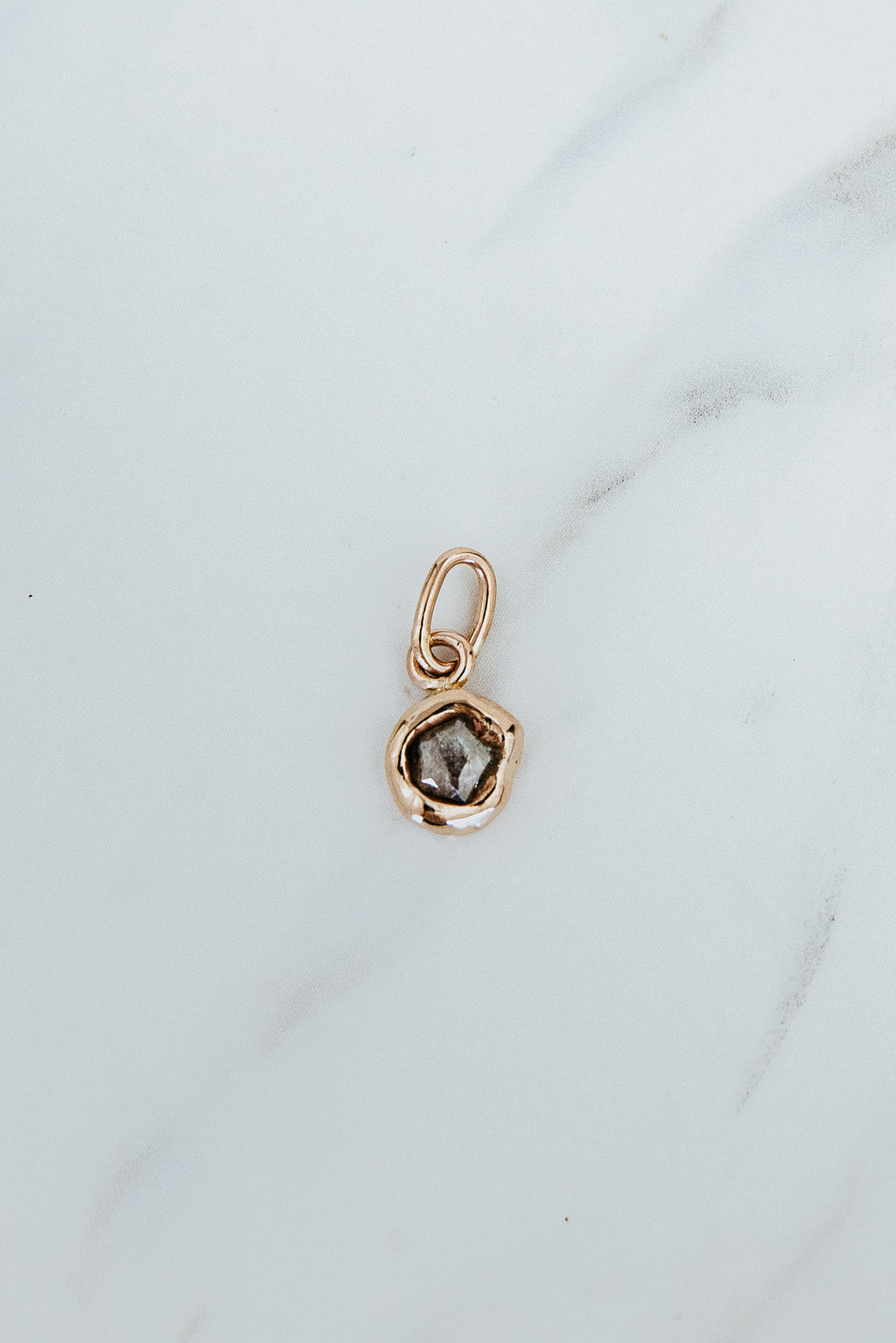 Wings Hawaii molten gold diamond necklace charm in 14k rose gold. Fine jewelry handcrafted in Maui. 