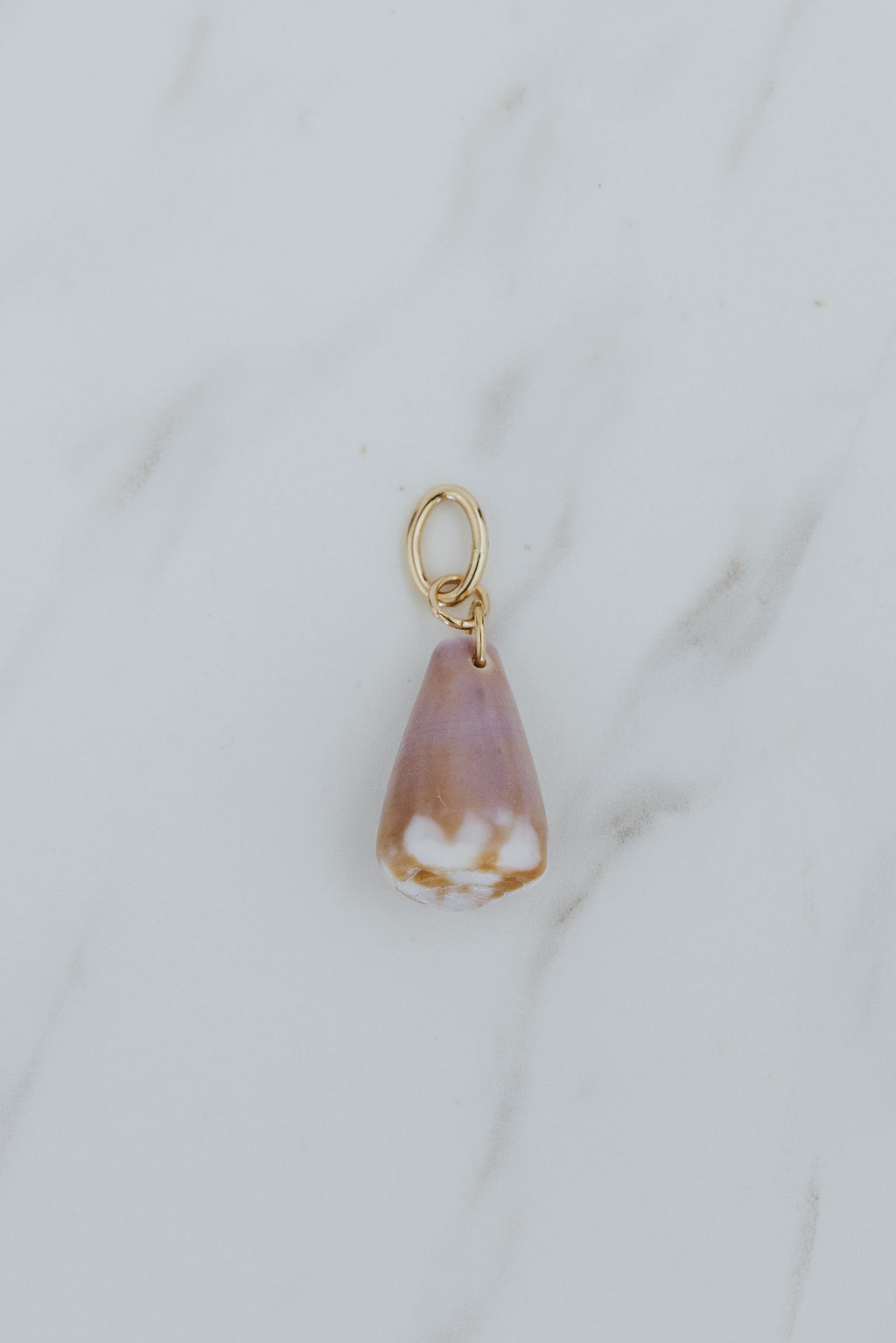Wings Hawaii pink and purple Cone Shell necklace charms in 14k gold-filled or sterling silver. Fine shell jewelry handcrafted in Maui. Modern beachy charm necklaces handmade with authentic Hawaiian sea shells. 