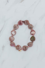 Wings Hawaii Rhodochrosite heart-shaped beads stretchy bracelet with 14k gold-filled tag. Crystal chakra healing. Boho-chic spiritual jewelry handmade in Maui. thumbnail