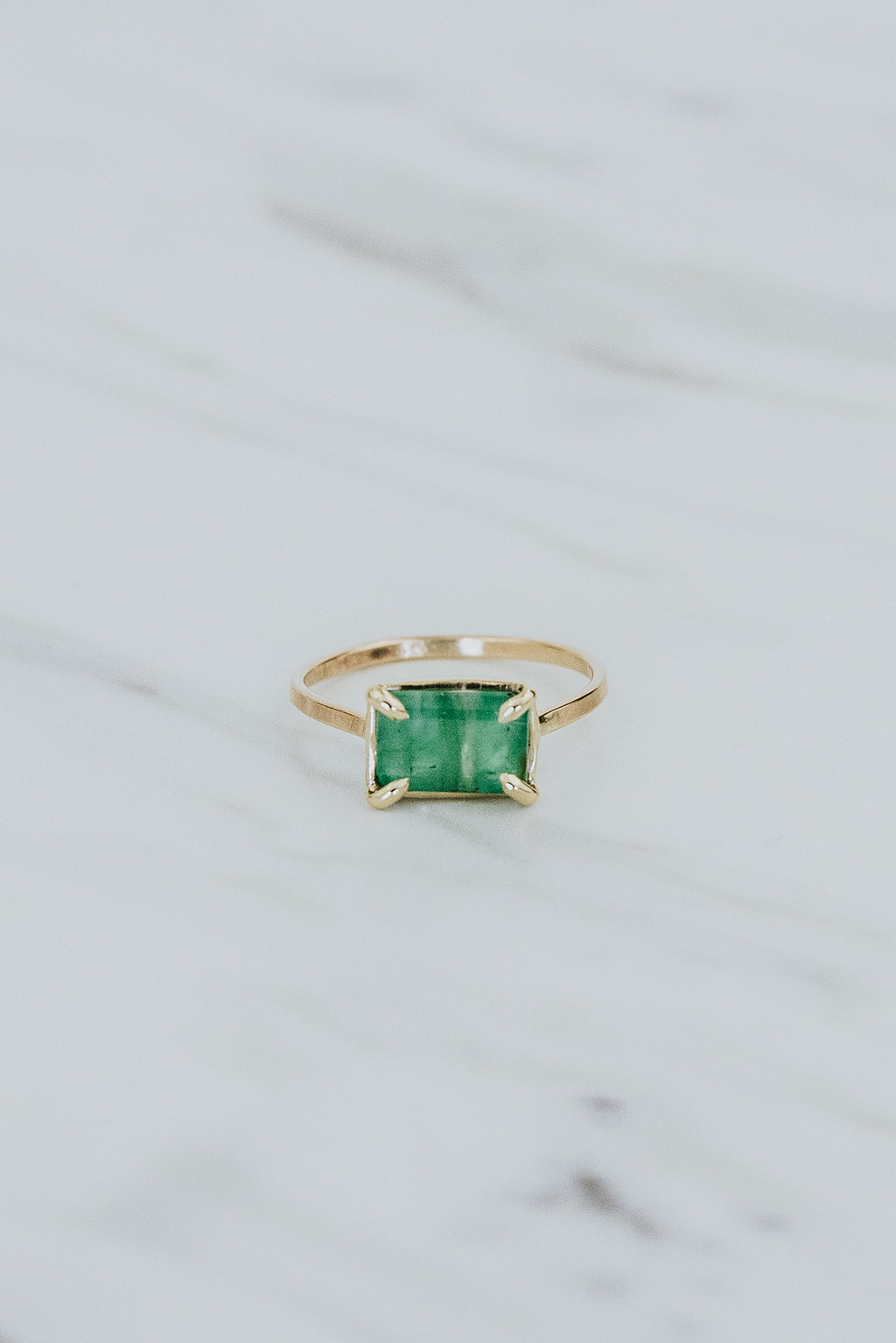 Wings Hawaii Astra ring with emerald in solid 14k yellow gold. Fine jewelry handmade in Maui. 