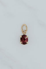 Wings Hawaii tourmaline necklace charm in 14k yellow gold. Fine jewelry handmade in Maui. Luxury charm necklaces. Mix match customize. 