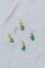 Wings Hawaii Apatite gemstone necklace charms in 14k gold-filled. Fine jewelry handcrafted in Maui. Modern boho charm necklaces handmade with aloha in Hawaii. 