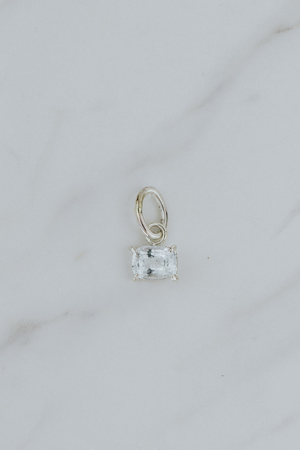 Wings Hawaii aquamarine necklace charm, prong-set in sterling silver. Fine jewelry handcrafted in Maui. Mix, match, customize modern charm jewelry at the Wings Hawaii Charm Bar. 