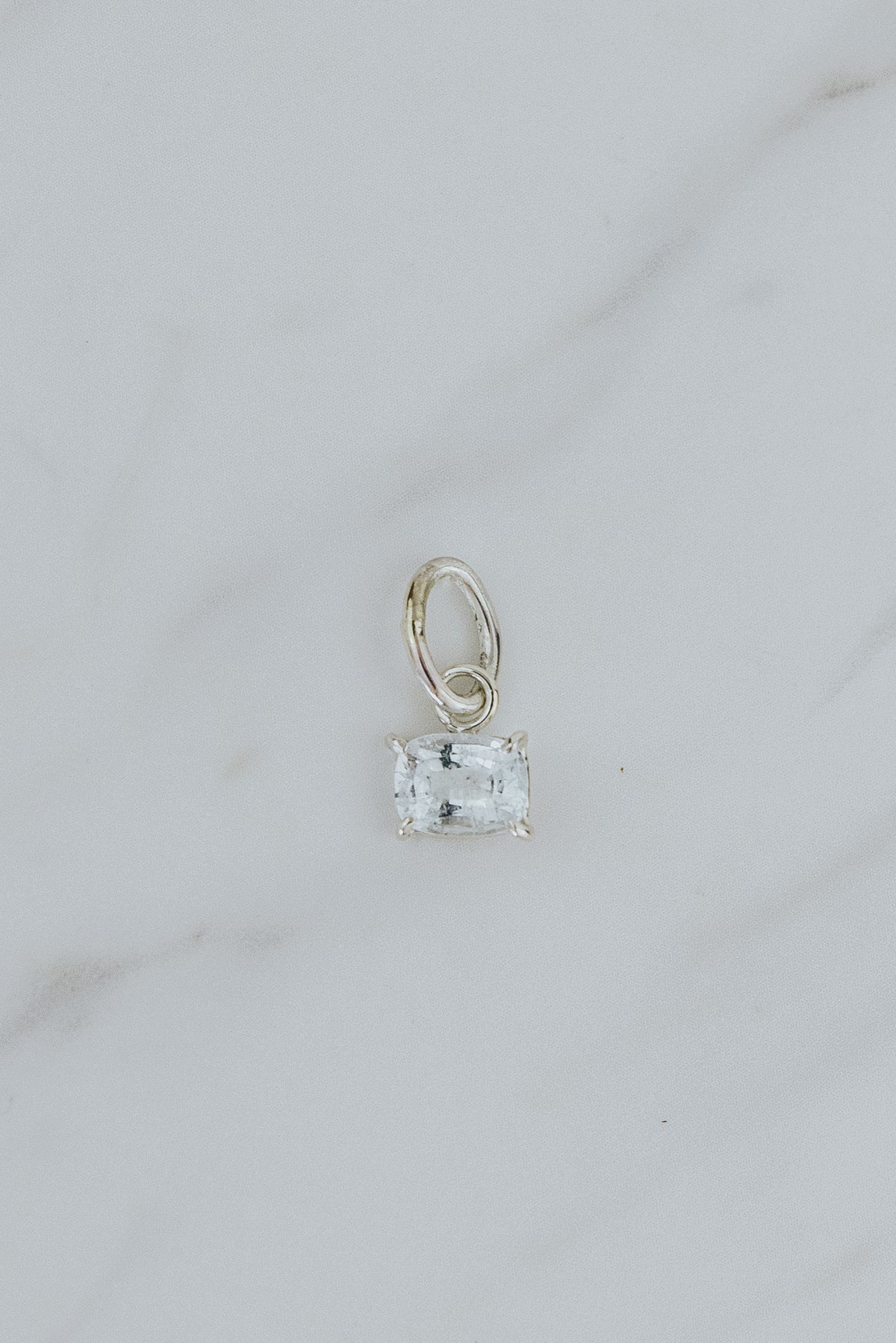 Wings Hawaii aquamarine necklace charm, prong-set in sterling silver. Fine jewelry handcrafted in Maui. Mix, match, customize modern charm jewelry at the Wings Hawaii Charm Bar. 