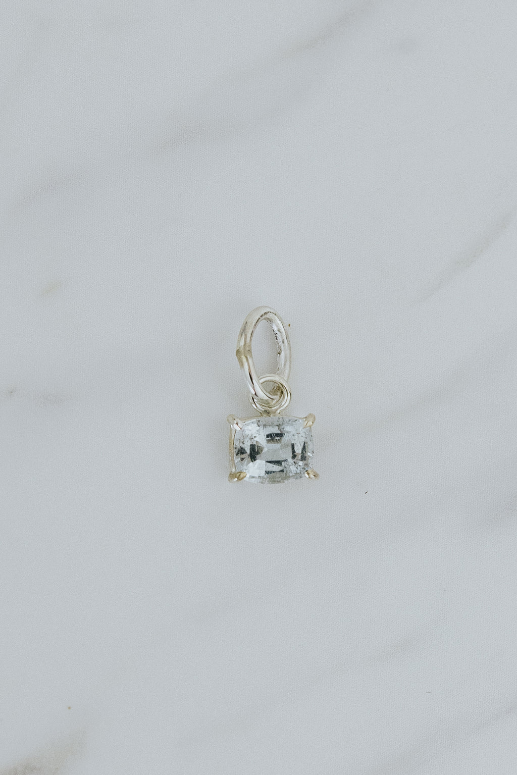 Wings Hawaii aquamarine necklace charm, prong-set in sterling silver. Fine jewelry handcrafted in Maui. Mix, match, customize modern charm jewelry at the Wings Hawaii Charm Bar. 