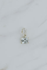 Wings Hawaii aquamarine necklace charm, prong-set in sterling silver. Fine jewelry handcrafted in Maui. Mix, match, customize modern charm jewelry at the Wings Hawaii Charm Bar.  thumbnail