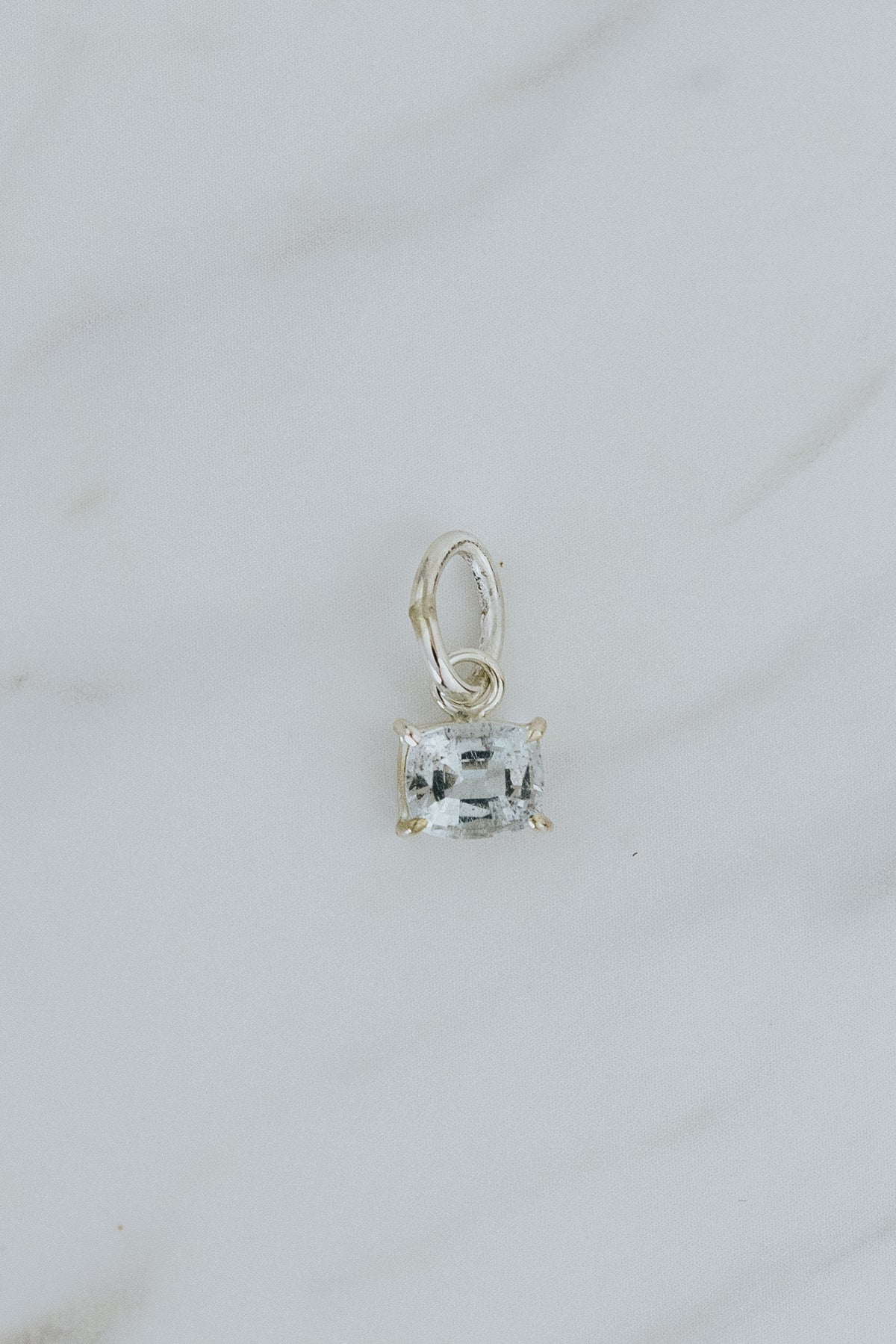 Wings Hawaii aquamarine necklace charm, prong-set in sterling silver. Fine jewelry handcrafted in Maui. Mix, match, customize modern charm jewelry at the Wings Hawaii Charm Bar. 