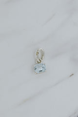 Wings Hawaii aquamarine necklace charm, prong-set in sterling silver. Fine jewelry handcrafted in Maui. Mix, match, customize modern charm jewelry at the Wings Hawaii Charm Bar.  thumbnail