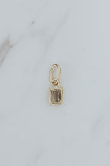Wings Hawaii Nova Necklace Charm in Sunstone and solid 14k yellow gold. Fine jewelry handmade in Maui. 
