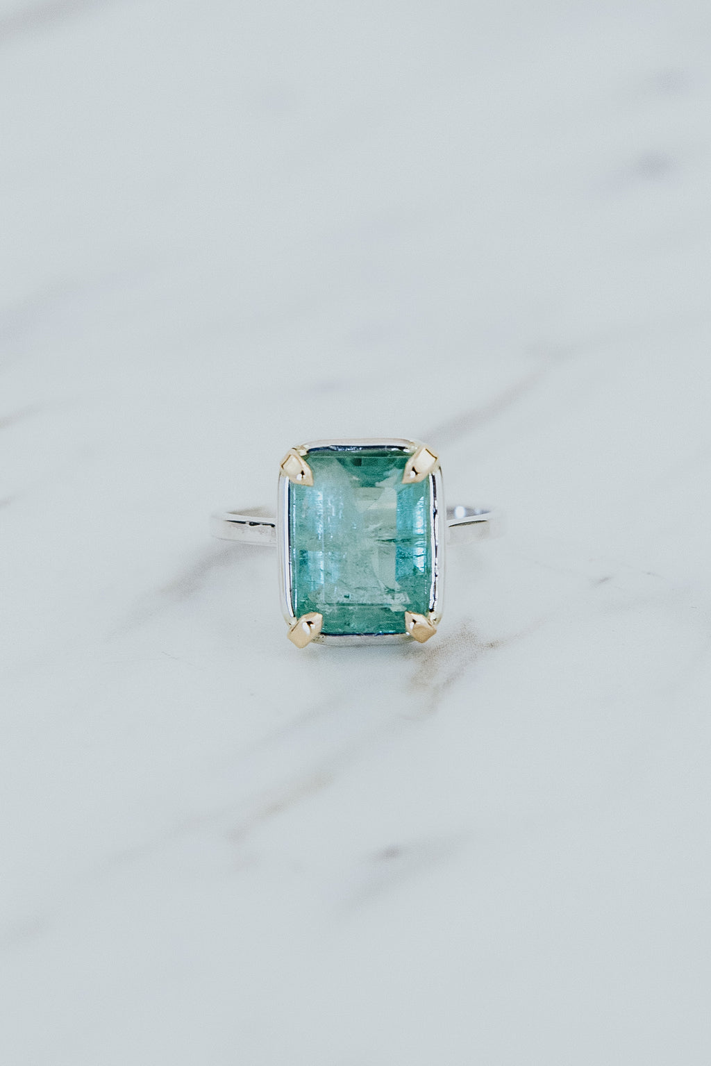Wings Hawaii Venus Ring Blue Tourmaline in 14k gold-filled and sterling silver mixed metals. Fine jewelry handcrafted in Maui. 