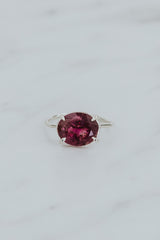 Wings Hawaii Halo ring – Deep Pink Tourmaline in sterling silver. Fine jewelry handcrafted in Maui. Oval-cut gemstone, single prong-set on delicate band. Made in Hawaii gifts.  thumbnail