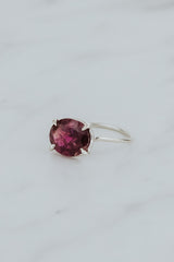 Wings Hawaii Halo ring – Deep Pink Tourmaline in sterling silver. Fine jewelry handcrafted in Maui. Oval-cut gemstone, single prong-set on delicate band. Made in Hawaii gifts.  thumbnail