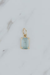 Wings Hawaii Aquamarine necklace charm. Emerald-cut and prong-set in 14k gold-filled. Fine jewelry handcrafted with aloha in Maui. Charm Bar collection. Mix, match, customize modern charm jewelry made in Hawaii.  thumbnail