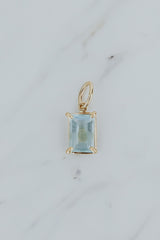 Wings Hawaii Aquamarine necklace charm. Emerald-cut and prong-set in 14k gold-filled. Fine jewelry handcrafted with aloha in Maui. Charm Bar collection. Mix, match, customize modern charm jewelry made in Hawaii.  thumbnail