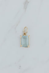 Wings Hawaii Aquamarine necklace charm. Emerald-cut and prong-set in 14k gold-filled. Fine jewelry handcrafted with aloha in Maui. Charm Bar collection. Mix, match, customize modern charm jewelry made in Hawaii.  thumbnail