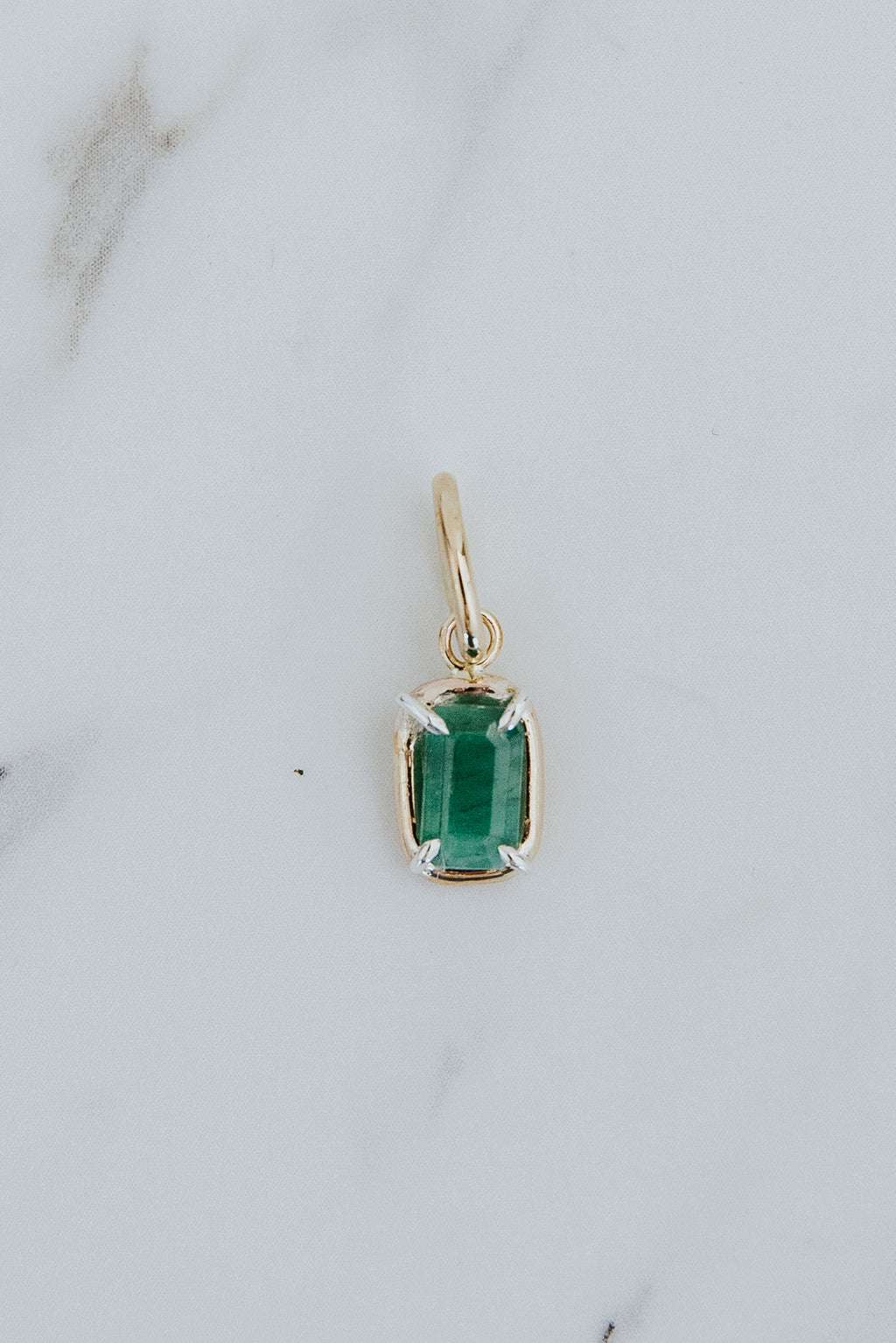 Wings Hawaii emerald green necklace charm in 14k gold-filled and sterling silver mixed metals. Fine jewelry handcrafted in Maui. 