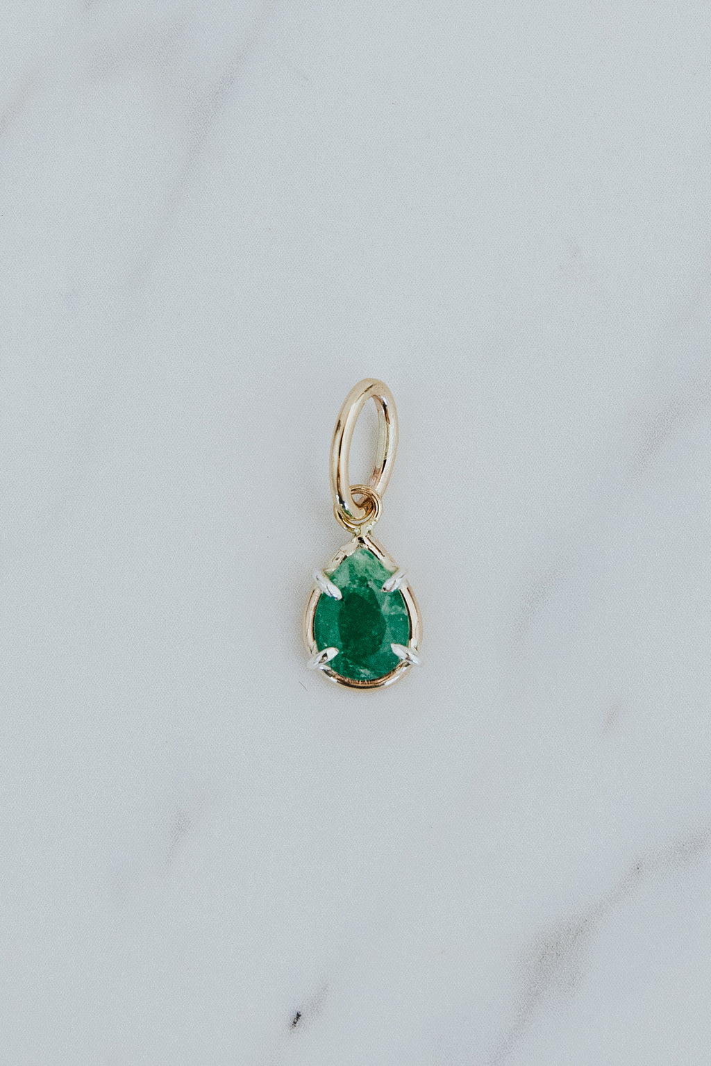 Wings Hawaii emerald green necklace charm in 14k gold-filled and sterling silver mixed metals. Fine jewelry handcrafted in Maui. 