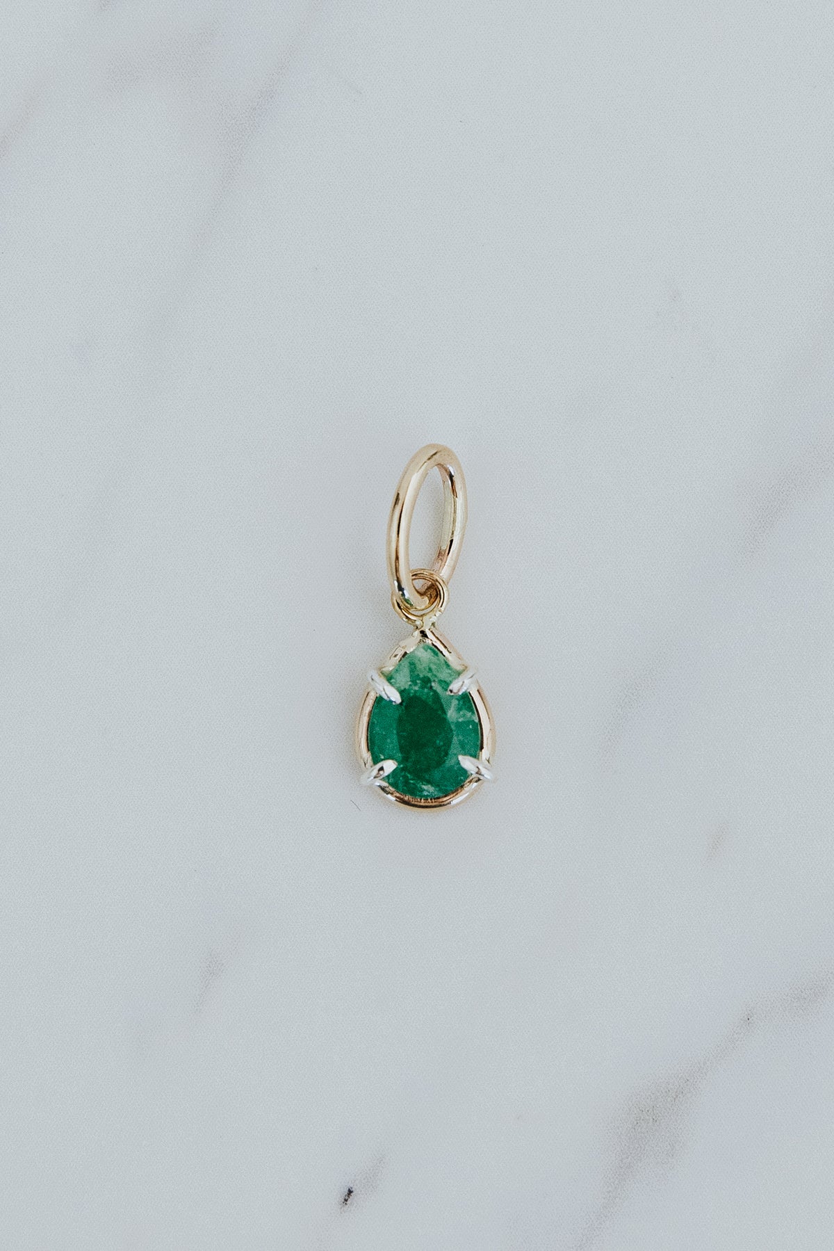 Wings Hawaii emerald green necklace charm in 14k gold-filled and sterling silver mixed metals. Fine jewelry handcrafted in Maui. 