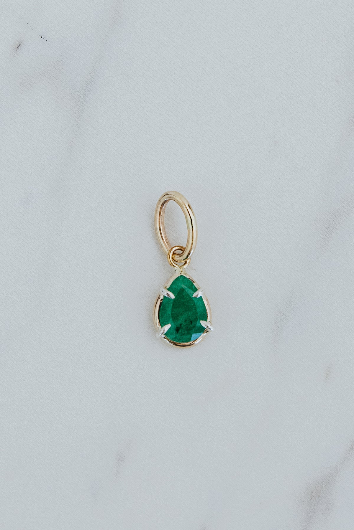 Wings Hawaii emerald green necklace charm in 14k gold-filled and sterling silver mixed metals. Fine jewelry handcrafted in Maui. 