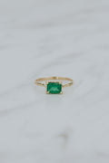 Wings Hawaii petite Astra ring with emerald in solid 14 yellow gold. Fine jewelry handcrafted in Maui. May birthstone gift, unique jewelry made in Hawaii. 