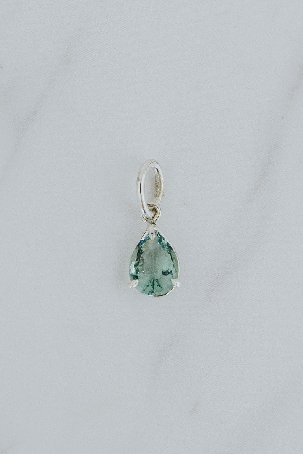 Wings Hawaii fluorite necklace charm pendant in sterling silver. Aqua blue, ocean green teardrop gemstone. Fine jewelry handcrafted with aloha in Maui. 