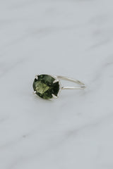 Wings Hawaii Halo ring – Green Tourmaline in sterling silver. Fine jewelry handcrafted in Maui. Oval-cut gemstone, single prong-set on delicate band. Made in Hawaii gifts.  thumbnail