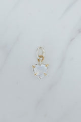 Wings Hawaii heart-shaped rainbow moonstone necklace charm in sterling silver and 14k yellow gold. Fine jewelry handcrafted in Maui. Modern charm necklaces made in Hawaii.  thumbnail