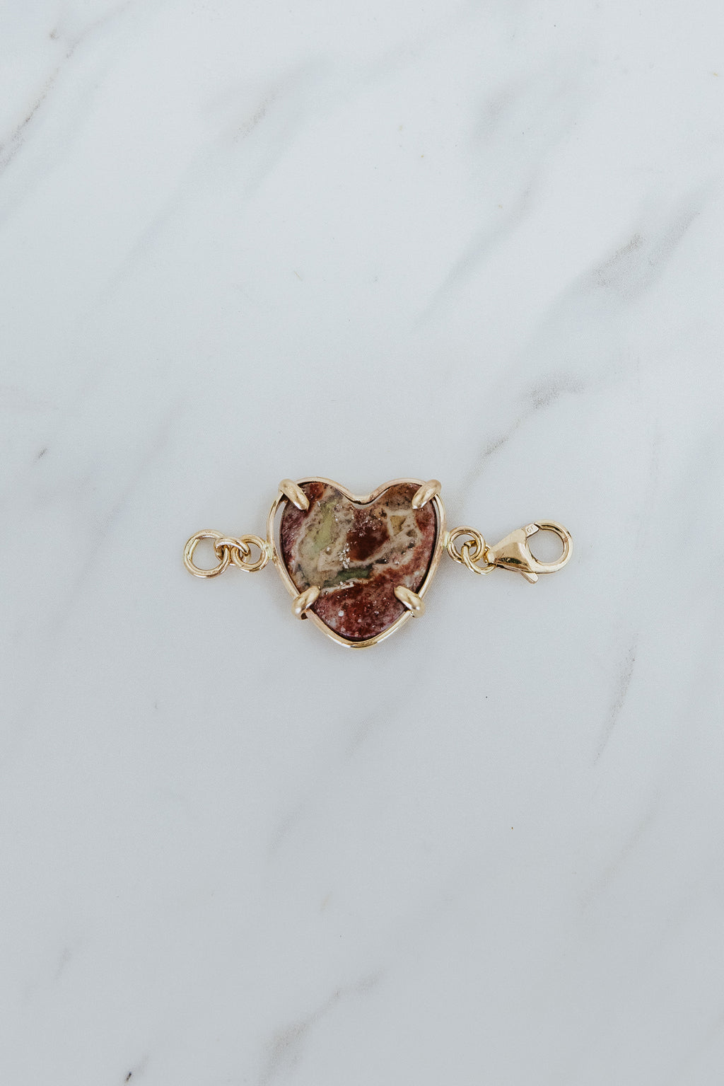 Wings Hawaii Mexican Fire Opal heart-shaped pendant in 14k gold-filled settings. Use as necklace or bracelet extender or clasp-on charm. Fine jewelry expertly handcrafted in Maui. 