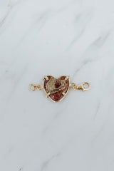 Wings Hawaii Mexican Fire Opal heart-shaped pendant in 14k gold-filled settings. Use as necklace or bracelet extender or clasp-on charm. Fine jewelry expertly handcrafted in Maui.  thumbnail