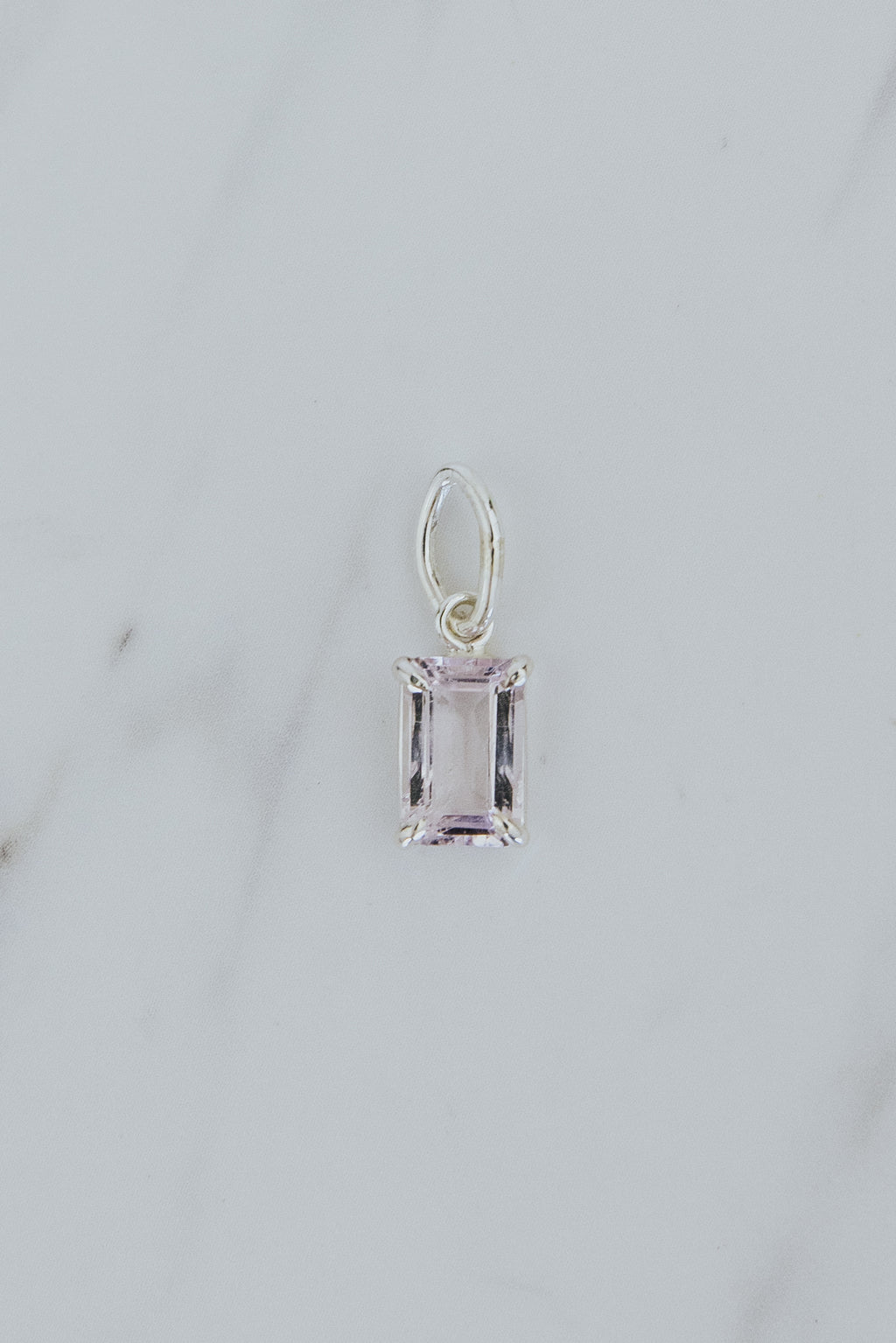 Wings Hawaii Morganite gemstone necklace charm in sterling silver. Fine jewelry handcrafted in Maui. Modern charm necklaces handmade in Hawaii. 