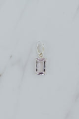Wings Hawaii Morganite gemstone necklace charm in sterling silver. Fine jewelry handcrafted in Maui. Modern charm necklaces handmade in Hawaii. 