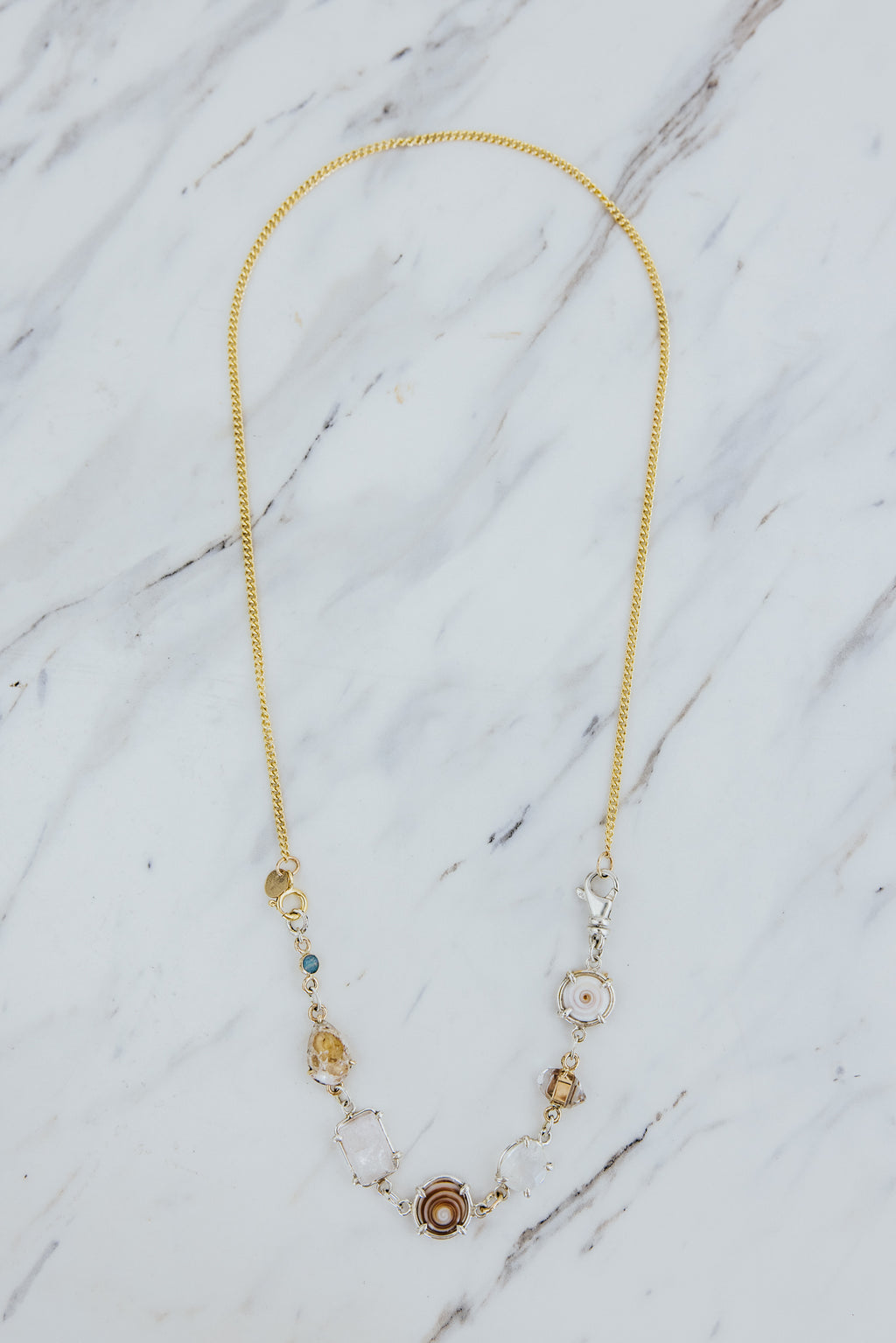 Wings Hawaii Multi Charm Talisman Necklace Extender with Australian Opal, Kunzite, Herkimer diamonds, Moonstone, and Mexican Fire Opal in mixed metals, solid 14k gold and sterling silver. Fine jewelry handcrafted in Maui. Endless custom styling possibilities. Mix and match with different length chains for chokers or longer necklaces.