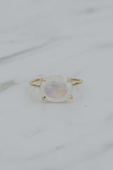 Wings Hawaii Halo ring – Moonstone in solid 14k yellow gold. Fine jewelry handcrafted in Maui. Oval-cut gemstone, single prong-set on delicate band. Made in Hawaii gifts.  thumbnail