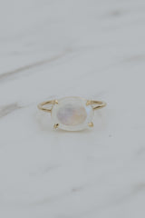 Wings Hawaii Halo ring – Moonstone in solid 14k yellow gold. Fine jewelry handcrafted in Maui. Oval-cut gemstone, single prong-set on delicate band. Made in Hawaii gifts. 