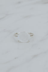 Wings Hawaii Halo ring – Moonstone in sterling silver. Fine jewelry handcrafted in Maui. Oval-cut gemstone, single prong-set on delicate band. Made in Hawaii gifts.  thumbnail