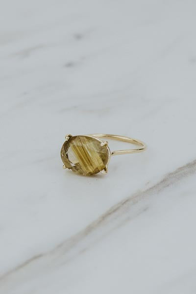 wings hawaii prong set rutilated quartz oval ring in 14k yellow gold 