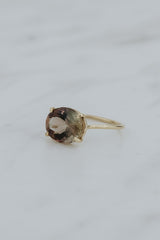 Wings Hawaii Halo ring – Deep Sunstone  in solid 14k yellow gold. Fine jewelry handcrafted in Maui. Oval-cut gemstone, single prong-set on delicate band. Made in Hawaii gifts.  thumbnail