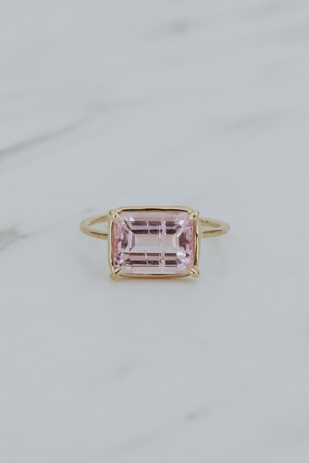 Wings Hawaii Astra ring – Pink Tourmaline in solid 14k yellow gold. Fine jewelry handcrafted in Maui. Rectangle gemstone, single prong-set on delicate band. Unique jewelry gifts made in Hawaii. 