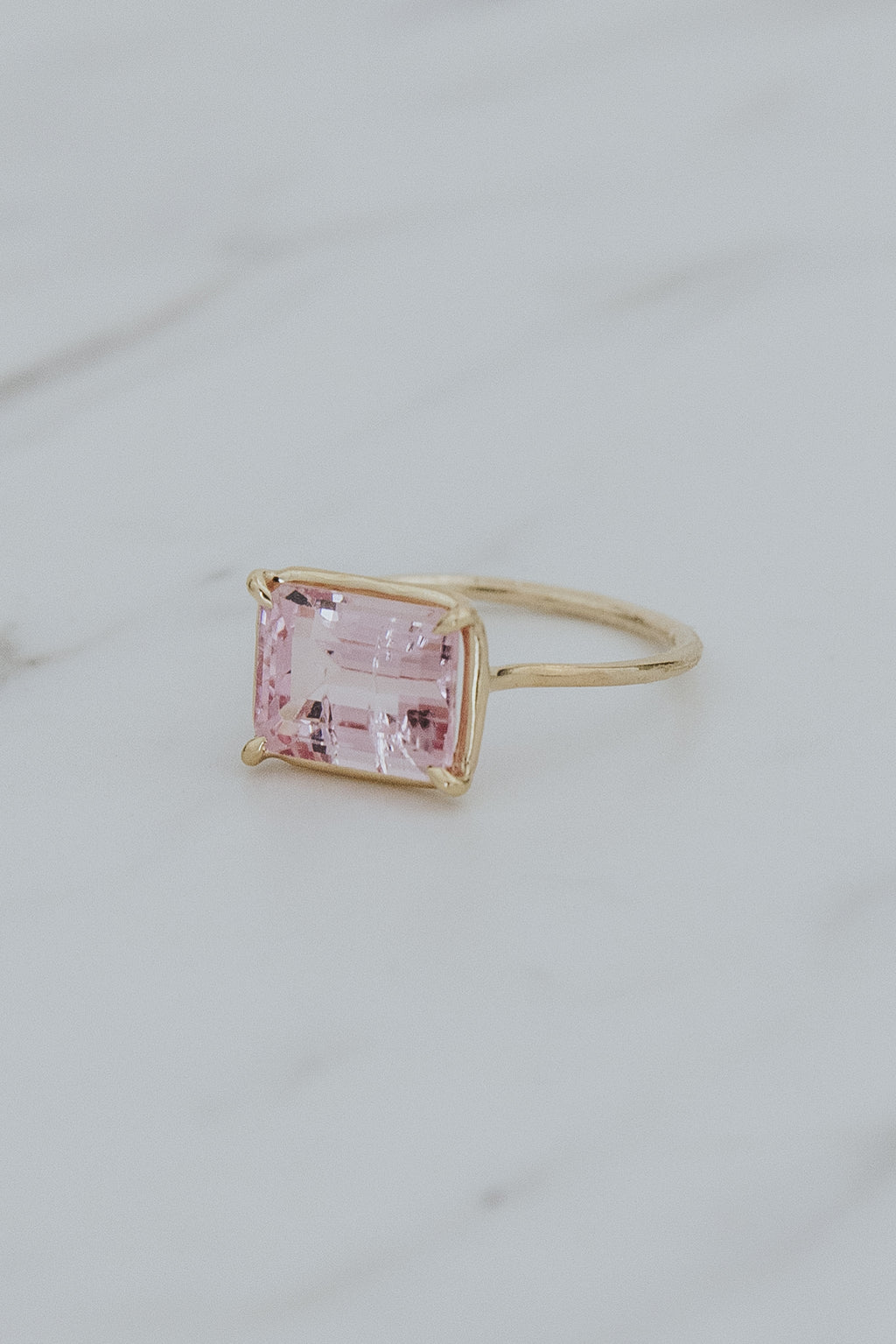 Wings Hawaii Astra ring – Pink Tourmaline in solid 14k yellow gold. Fine jewelry handcrafted in Maui. Rectangle gemstone, single prong-set on delicate band. Unique jewelry gifts made in Hawaii. 
