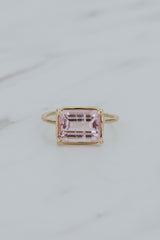 Wings Hawaii Astra ring – Pink Tourmaline in solid 14k yellow gold. Fine jewelry handcrafted in Maui. Rectangle gemstone, single prong-set on delicate band. Unique jewelry gifts made in Hawaii. 
