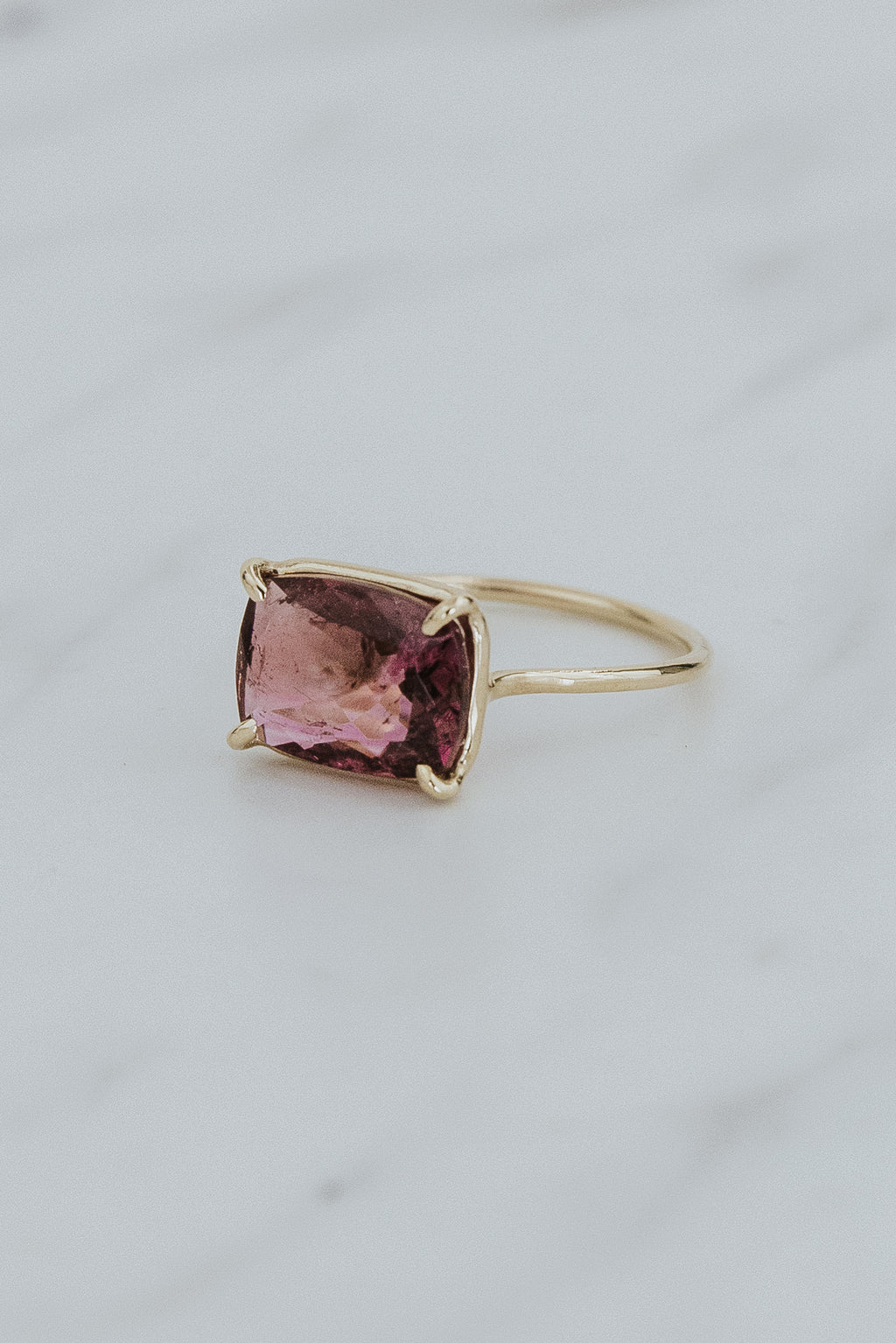 Wings Hawaii Astra ring – Pink Tourmaline in solid 14k yellow gold. Fine jewelry handcrafted in Maui. Rectangle gemstone, single prong-set on delicate band. Unique jewelry gifts made in Hawaii. 