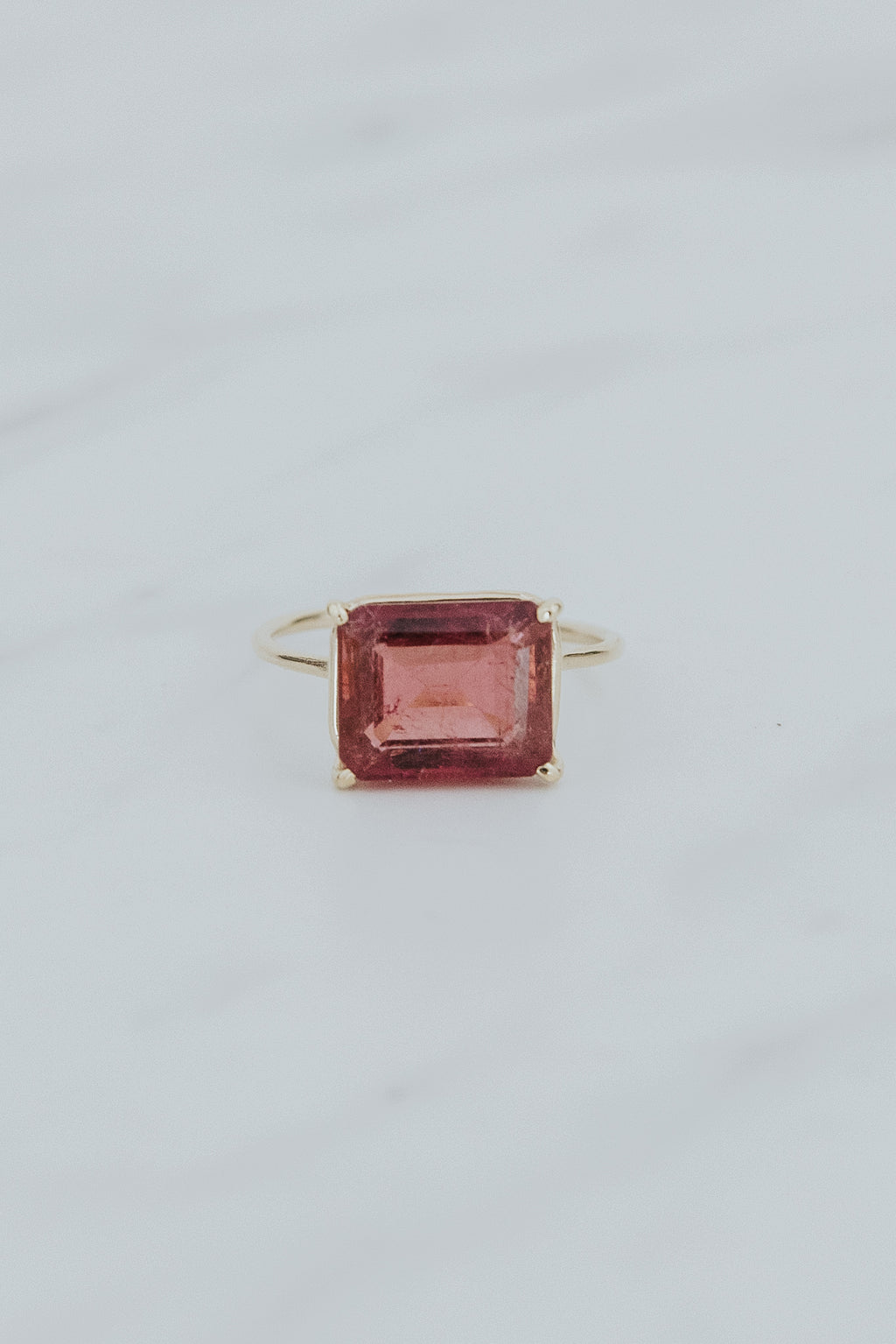 Wings Hawaii Astra ring – Rose Pink Tourmaline in solid 14k yellow gold. Fine jewelry handcrafted in Maui. Rectangle gemstone, single prong-set on delicate band. Unique jewelry gifts made in Hawaii. 