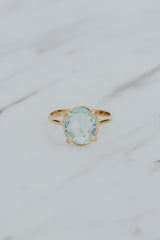 Wings Hawaii rose-cut, prong set Aquamarine Lyra ring in 14k gold-filled. Fine jewelry handcrafted in Maui. Light blue round gemstone in delicate gold ring. High quality jewelry made in Hawaii.  thumbnail