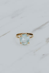 Wings Hawaii rose-cut, prong set Aquamarine Lyra ring in 14k gold-filled. Fine jewelry handcrafted in Maui. Light blue round gemstone in delicate gold ring. High quality jewelry made in Hawaii.  thumbnail