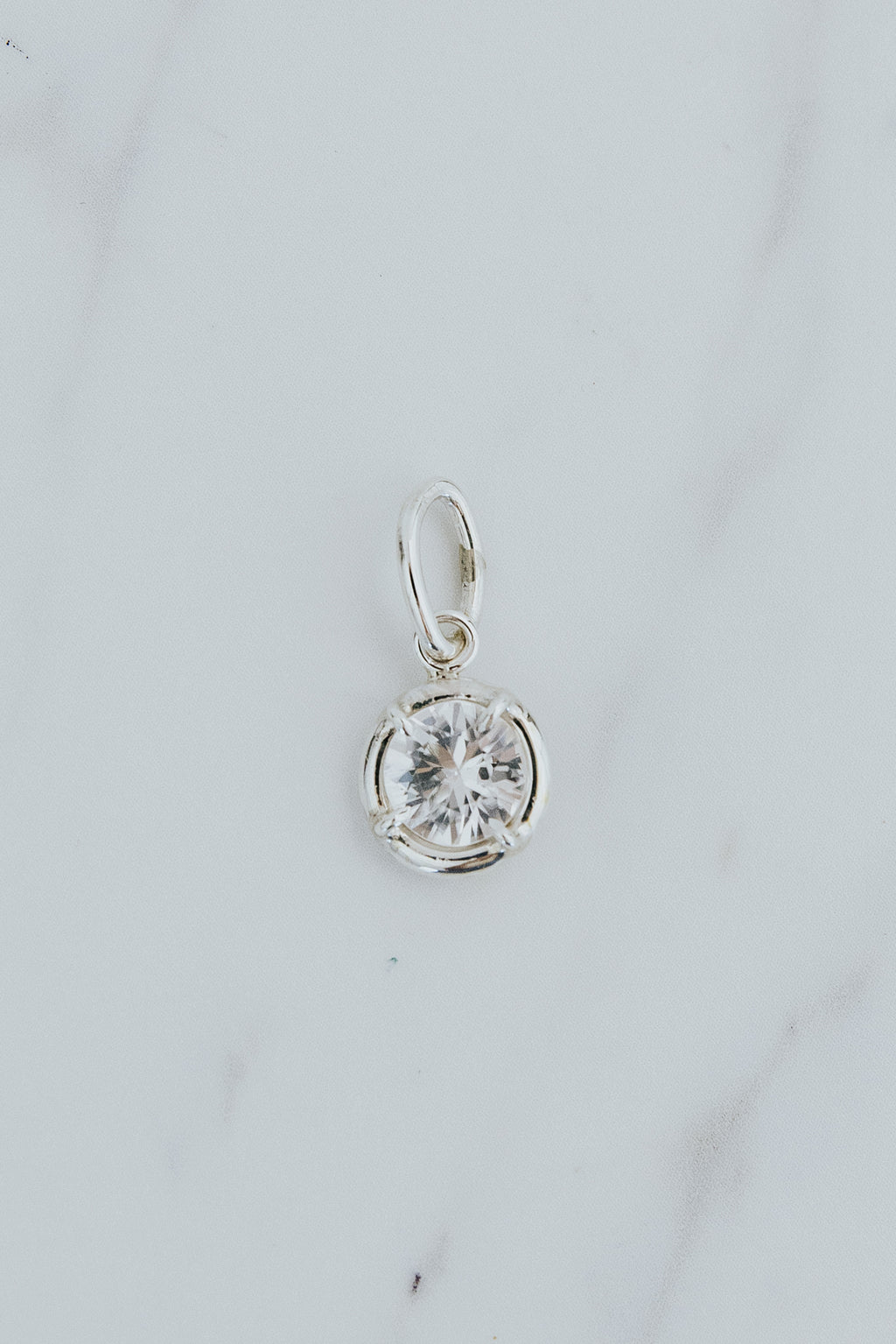 Wings Hawaii Zircon necklace charms in 14k gold-filled or sterling silver. Fine jewelry handcrafted in Maui. 