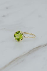 wings hawaii prong set peridot ring 14k yellow gold  thumbnail