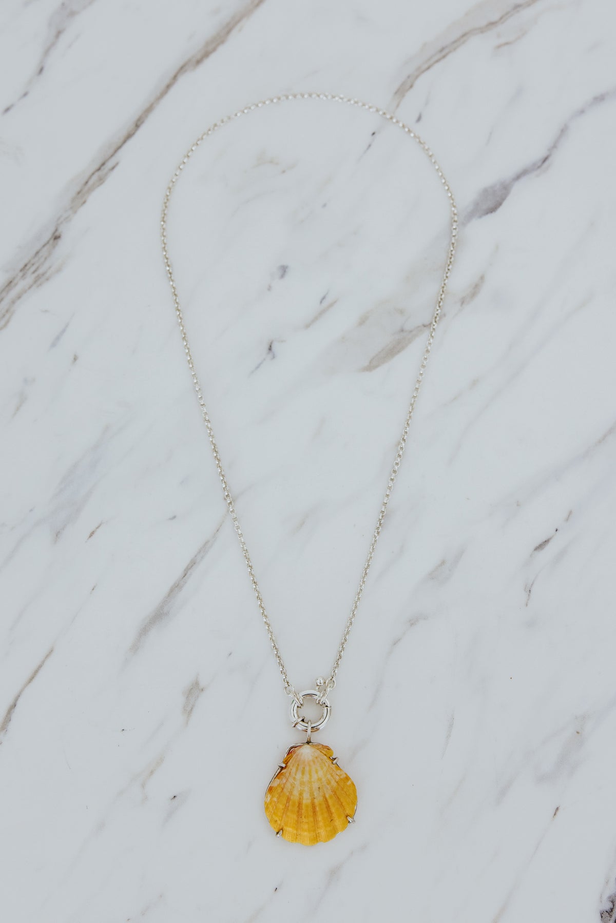 Wings Hawaii Symphony Necklace - Sunrise Shell in sterling silver. Fine jewelry expertly handcrafted in Maui with aloha. Authentic Hawaiian shell handmade jewelry. 