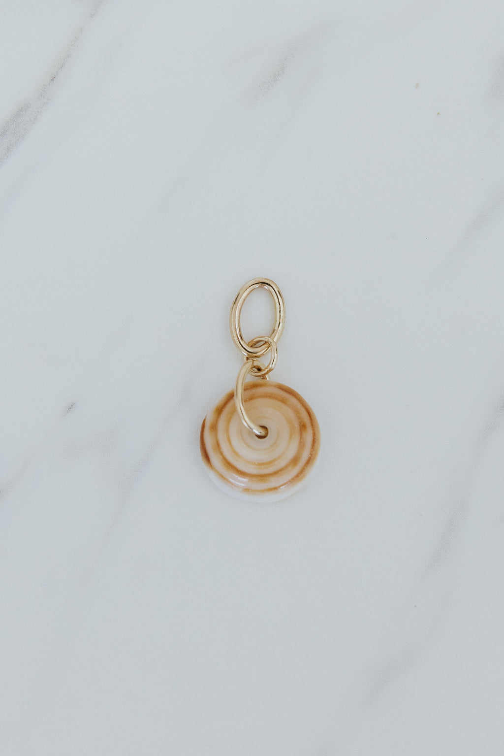 Wings Hawaii authentic Hawaiian Puka Shell necklace charm in 14k gold-filled. Fine jewelry handcrafted in Maui. Modern charm necklaces handmade in Hawaii. 